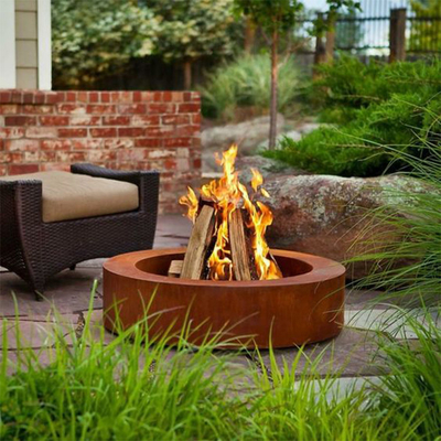 Okrągły odkryty ogród Corten Steel Fire Pit Camping do zewnętrznego spalania drewna